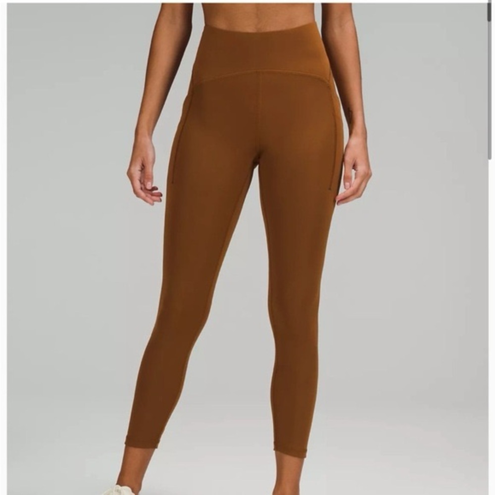 like new lululemon power thru high rise tight copper brown 25” size 4